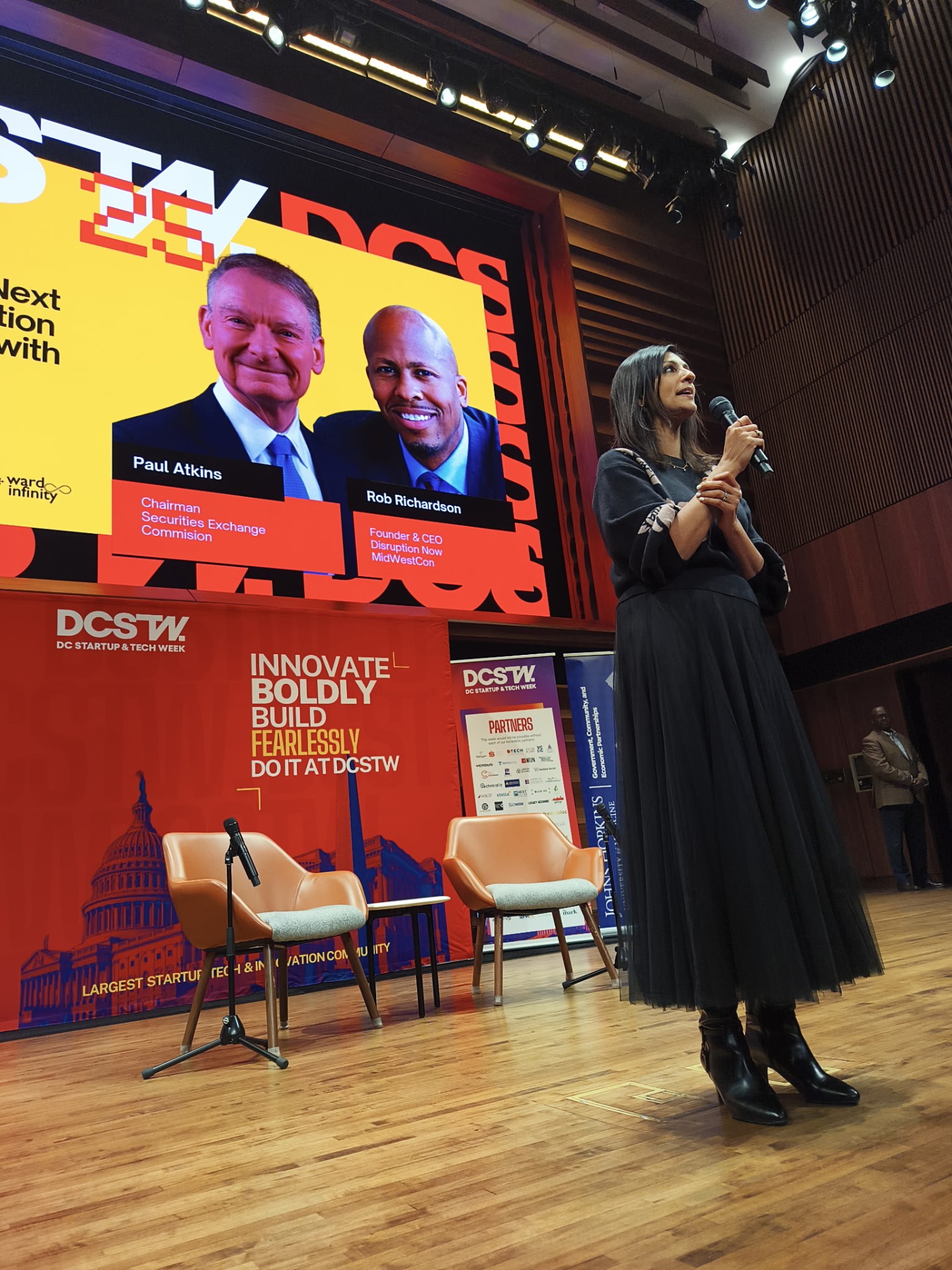 Seema Alexander speaking on stage at DC Startup Tech Week